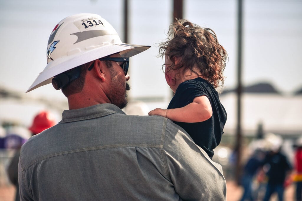 Lineman with child
